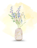 Watercolor-style illustration of a vase with pale pink and lavender flowers on a white background with a soft yellow watercolor wash behind it.