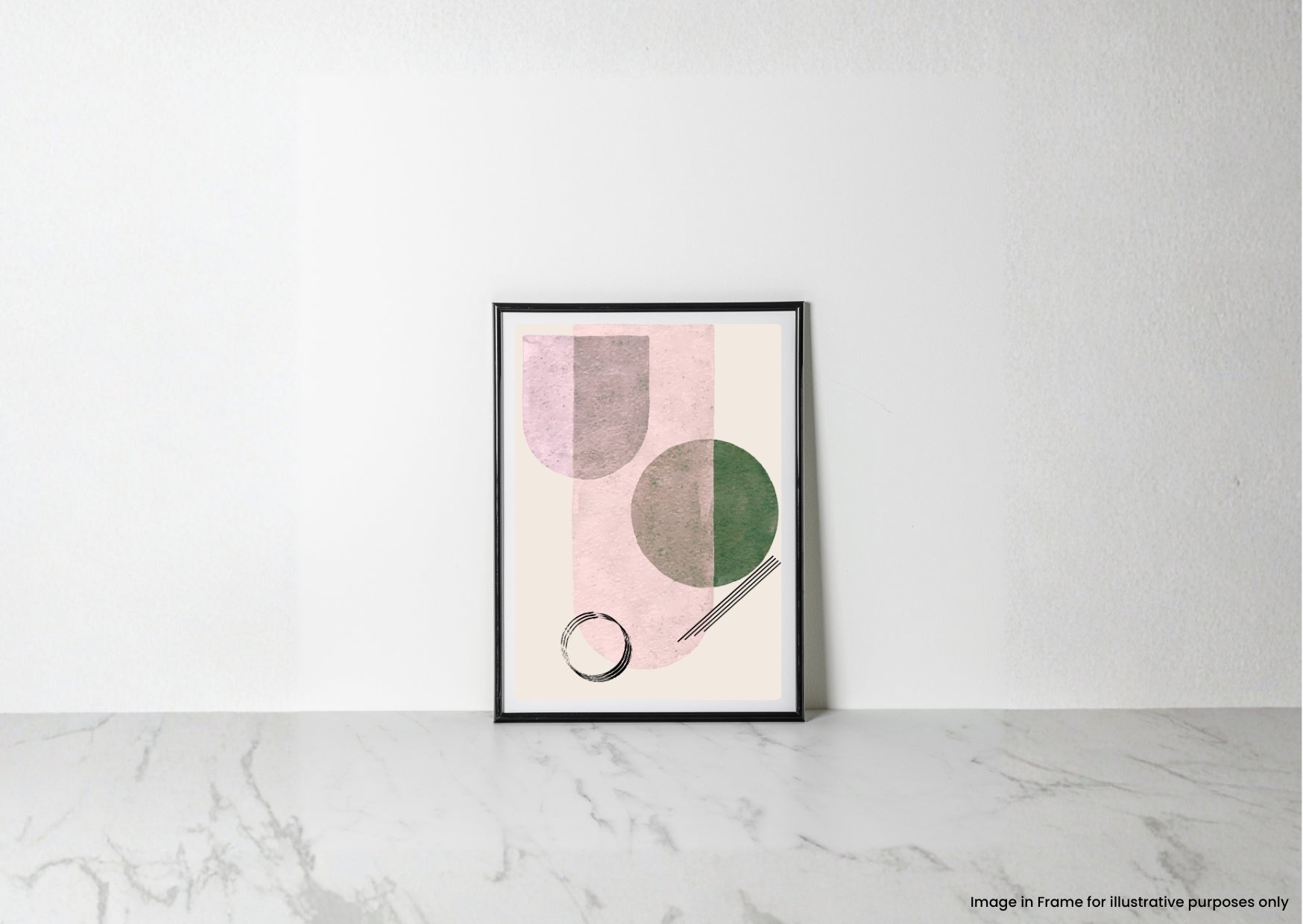 A framed abstract art print with pink, green, and gray geometric shapes, leaning against a white wall on a light marble surface.