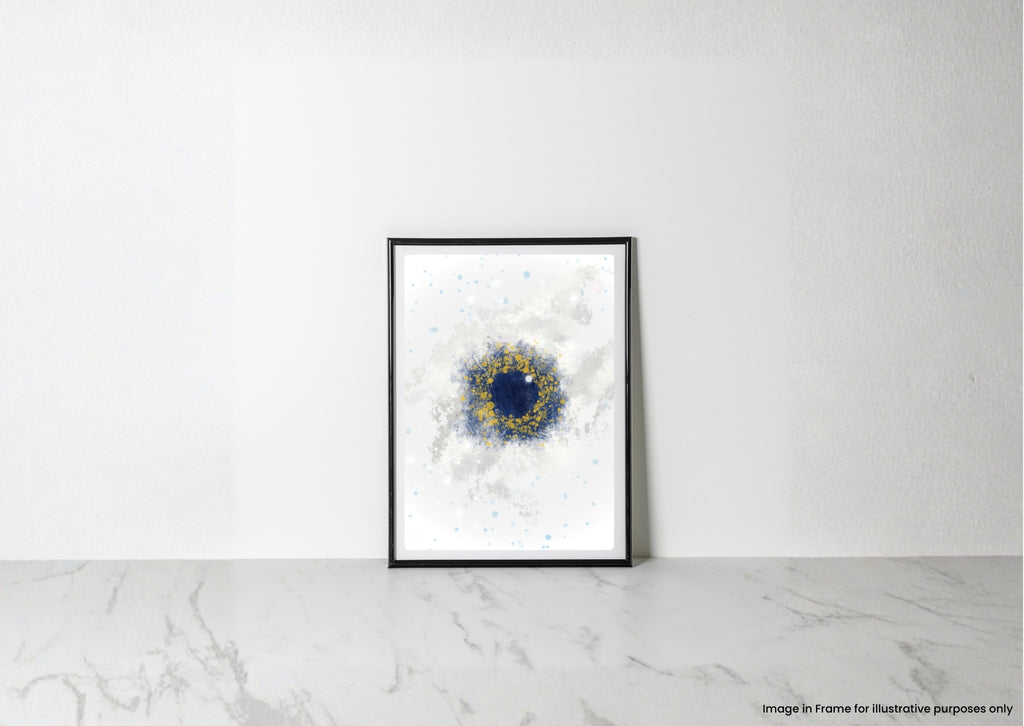 A framed abstract art print with a black frame, featuring a deep blue circular center and a textured gold ring on a white background, leaning against a white wall on a light marble surface.