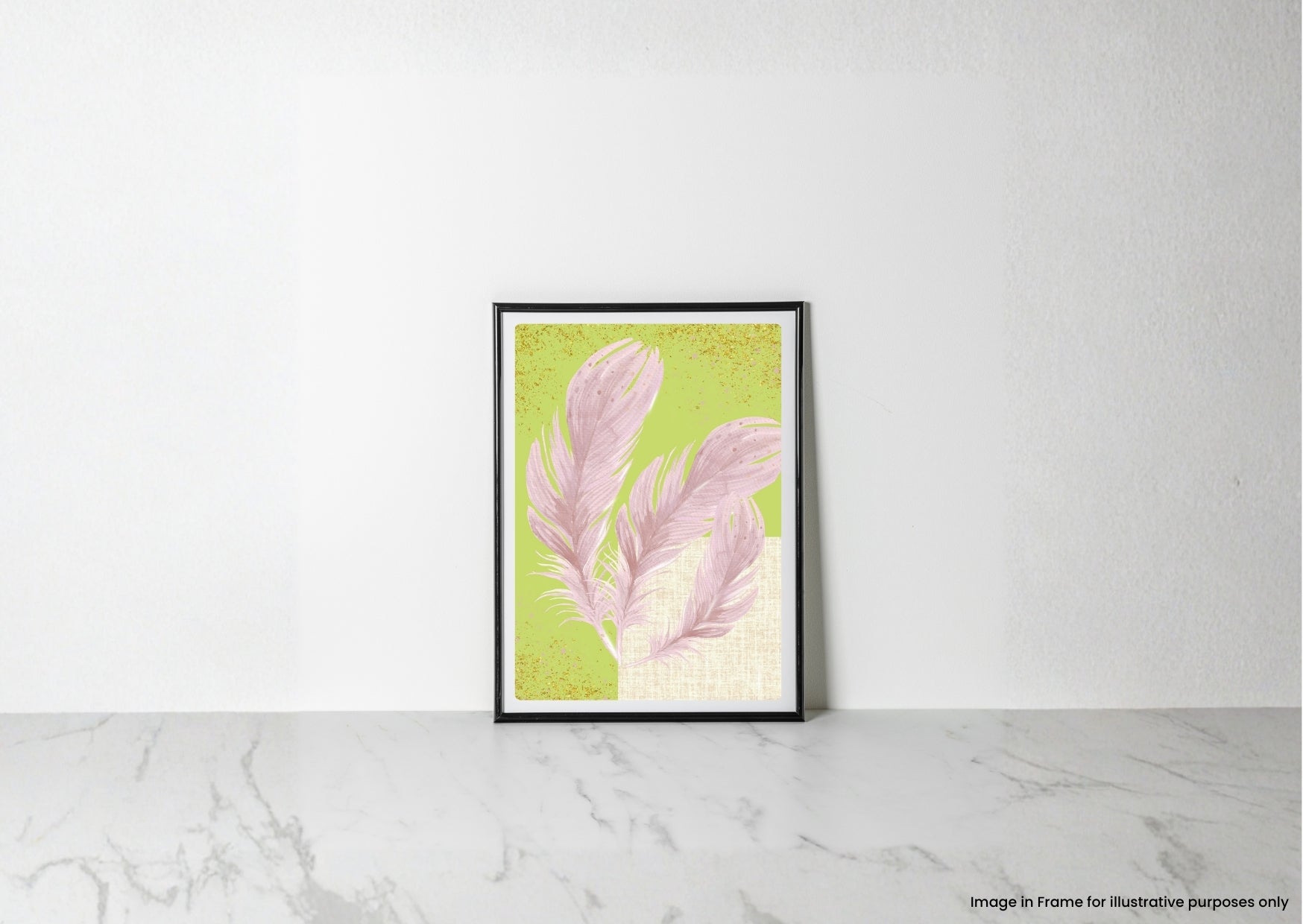 A framed art print featuring pink feathers on a textured light green background, leaning against a white wall on a light gray marble surface.