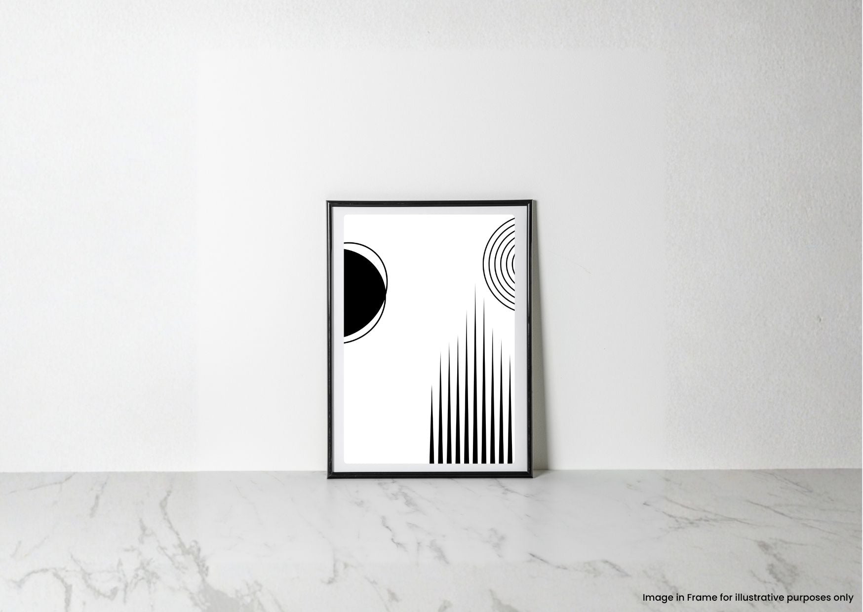 A minimalist black and white abstract art print in a thin black frame, leaning against a white wall on a light gray marble surface.