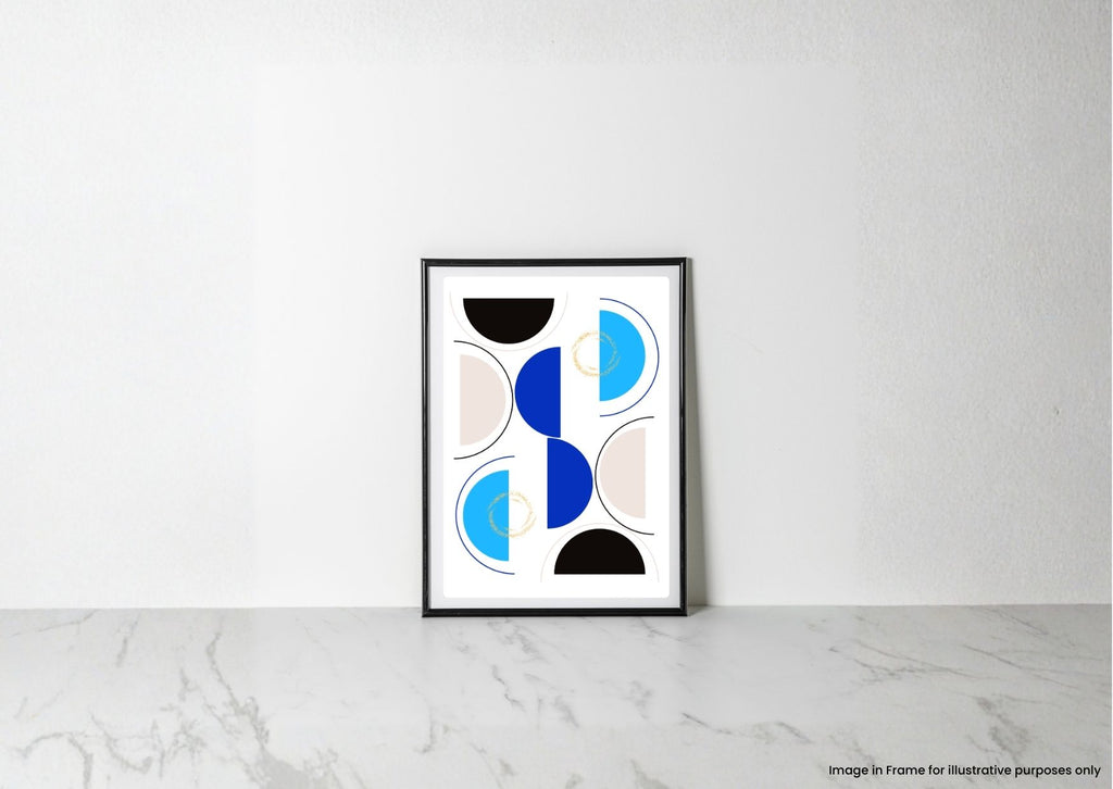 A framed abstract geometric art print with blue, black, and beige shapes on a white background, leaning against a white wall on a light marble surface.