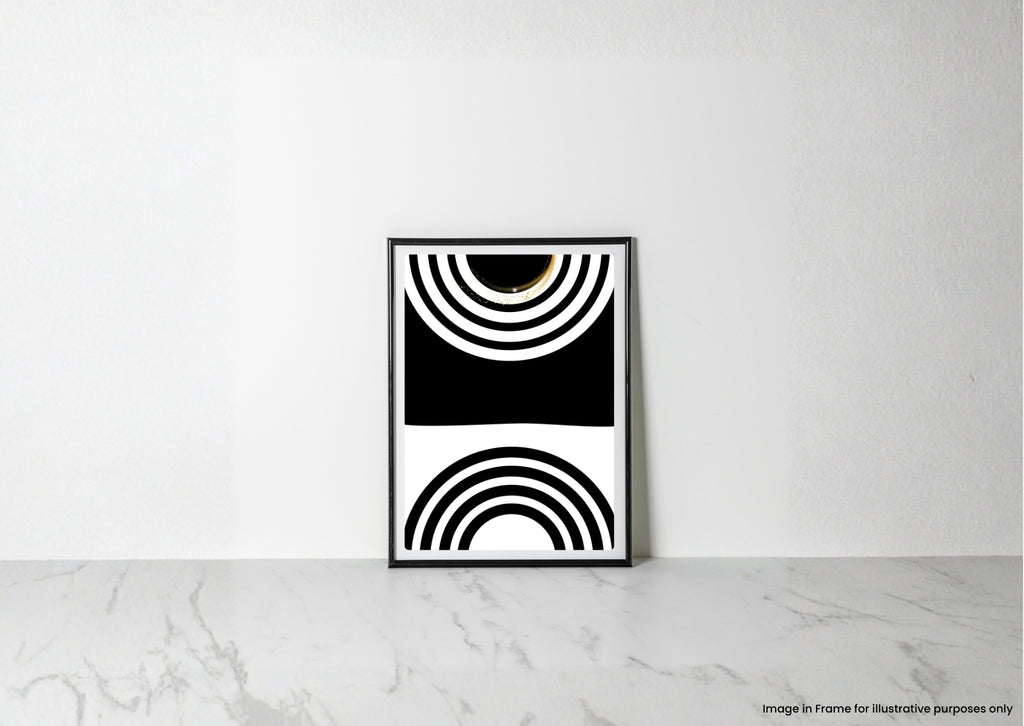A framed black and white geometric art print with concentric arch patterns, leaning against a white wall on a light marble surface.