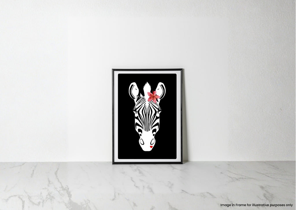 A framed art print featuring a stylized black and white zebra head with a small red flower on its forehead, leaning against a white wall on a light marble surface.