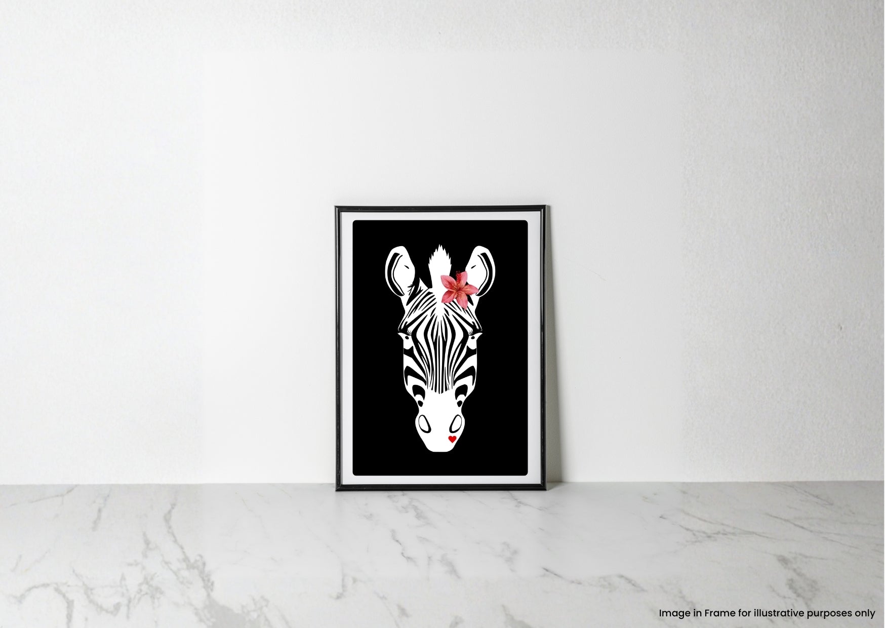 A framed art print featuring a stylized black and white zebra head with a small red flower on its forehead, leaning against a white wall on a light marble surface.