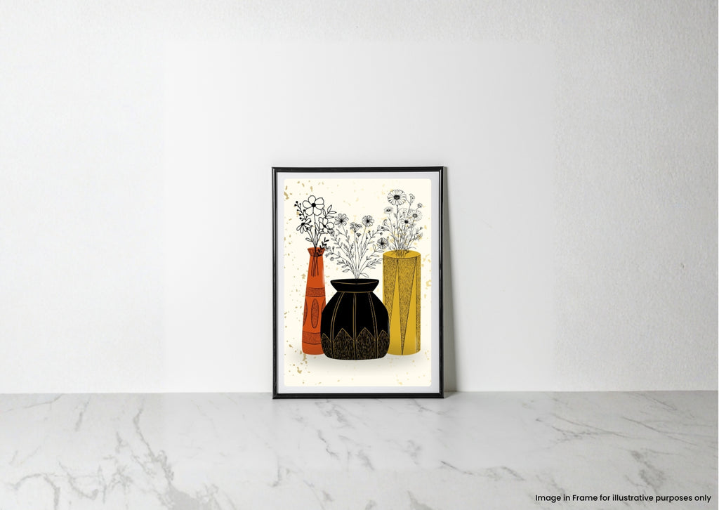 A framed art print featuring a minimalist illustration of three vases with wildflowers, leaning against a white wall on a light marble surface.