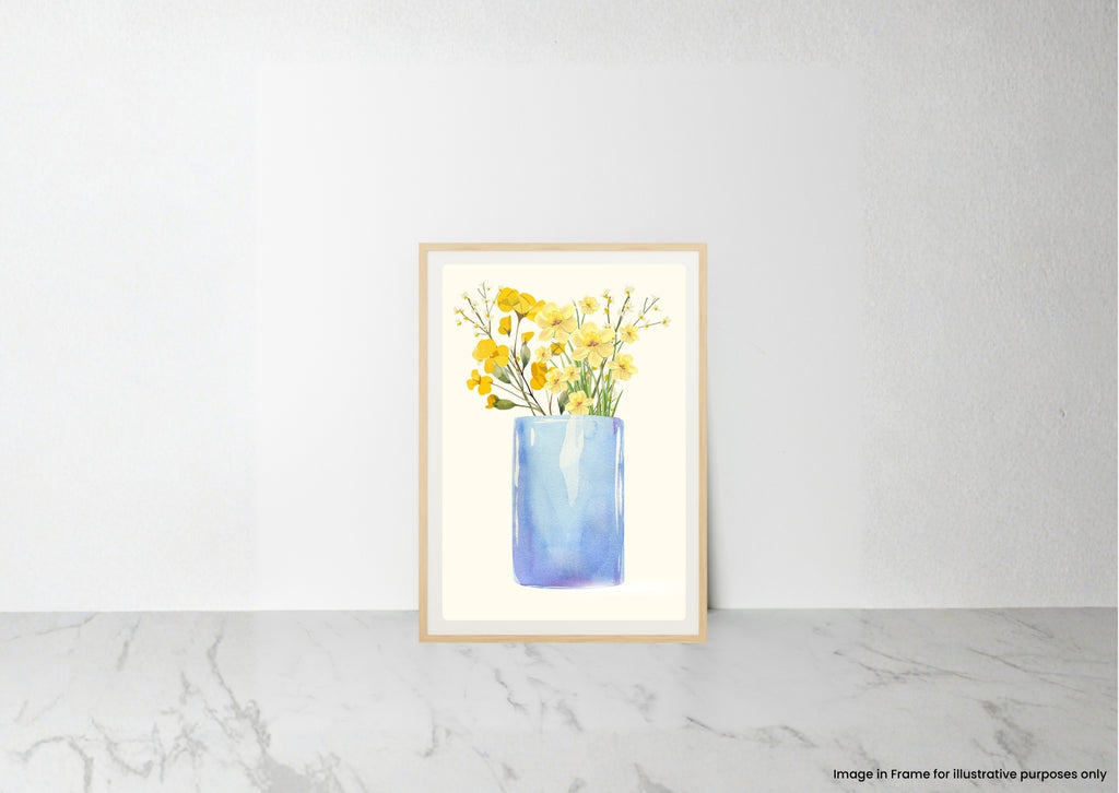 A framed watercolor art print of yellow flowers in a blue vase, displayed on a light gray marble surface against a white wall.