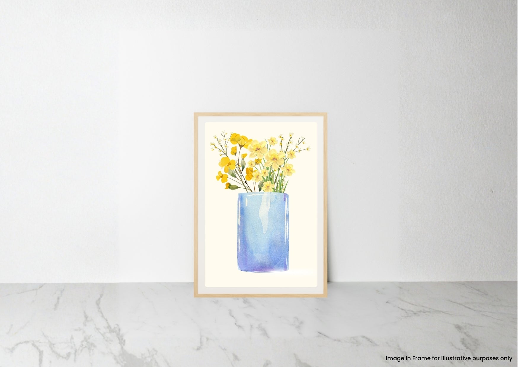 A framed watercolor art print of yellow flowers in a blue vase, displayed on a light gray marble surface against a white wall.