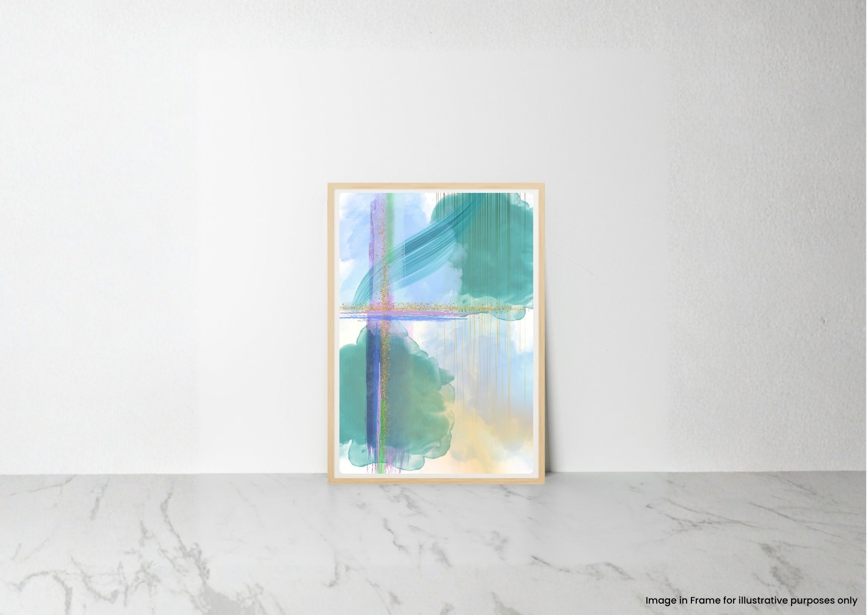A framed abstract art print with teal, green, blue, and cream brushstrokes, leaning against a white wall on a light marble surface.