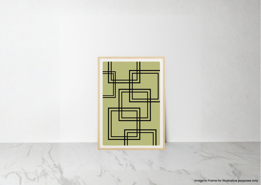 A framed abstract art print with black geometric lines on a muted olive green background, leaning against a white wall on a light marble surface.