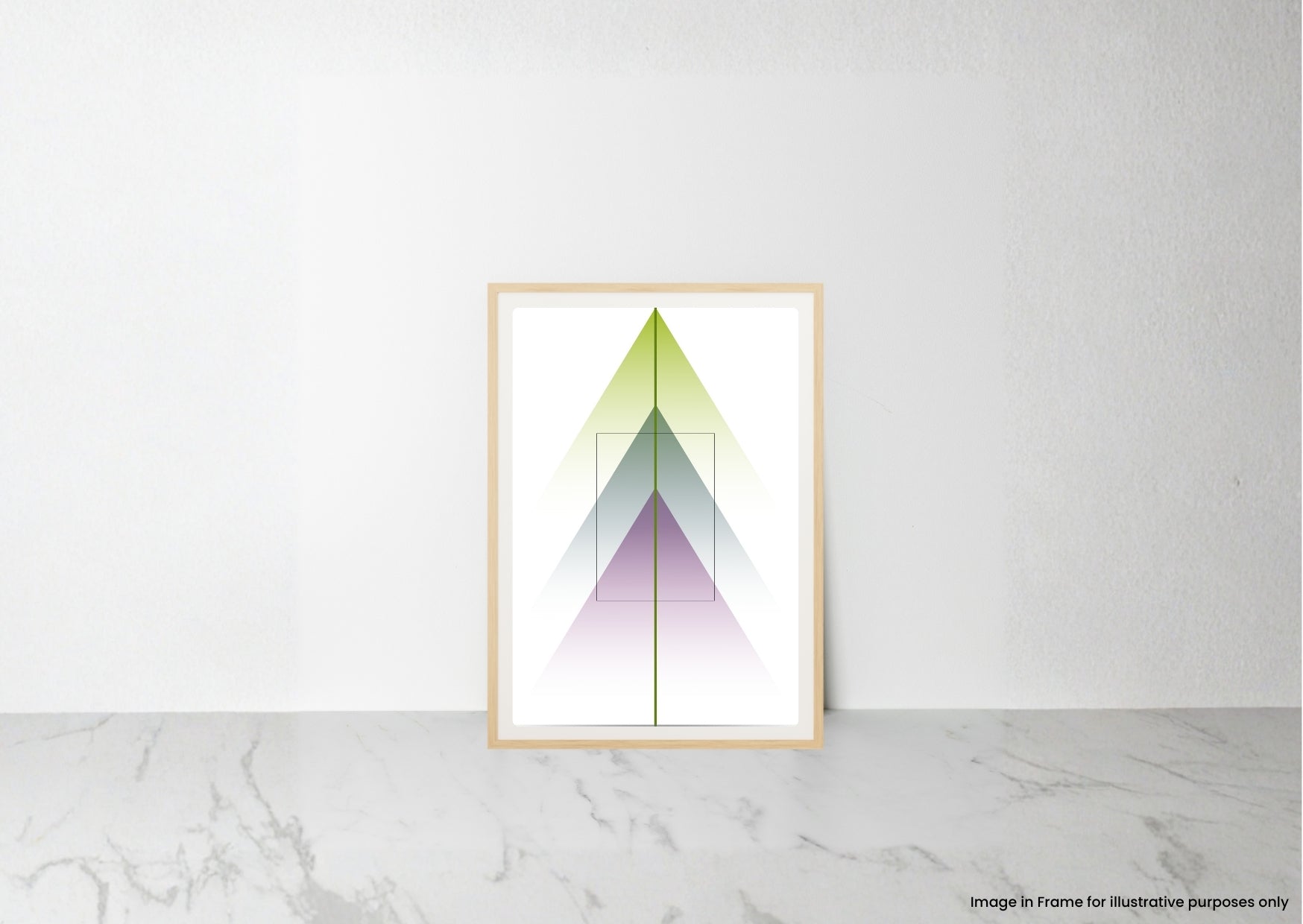 A framed minimalist art print featuring overlapping geometric triangles in green, blue, and purple on a white background, leaning against a white wall on a light marble surface.