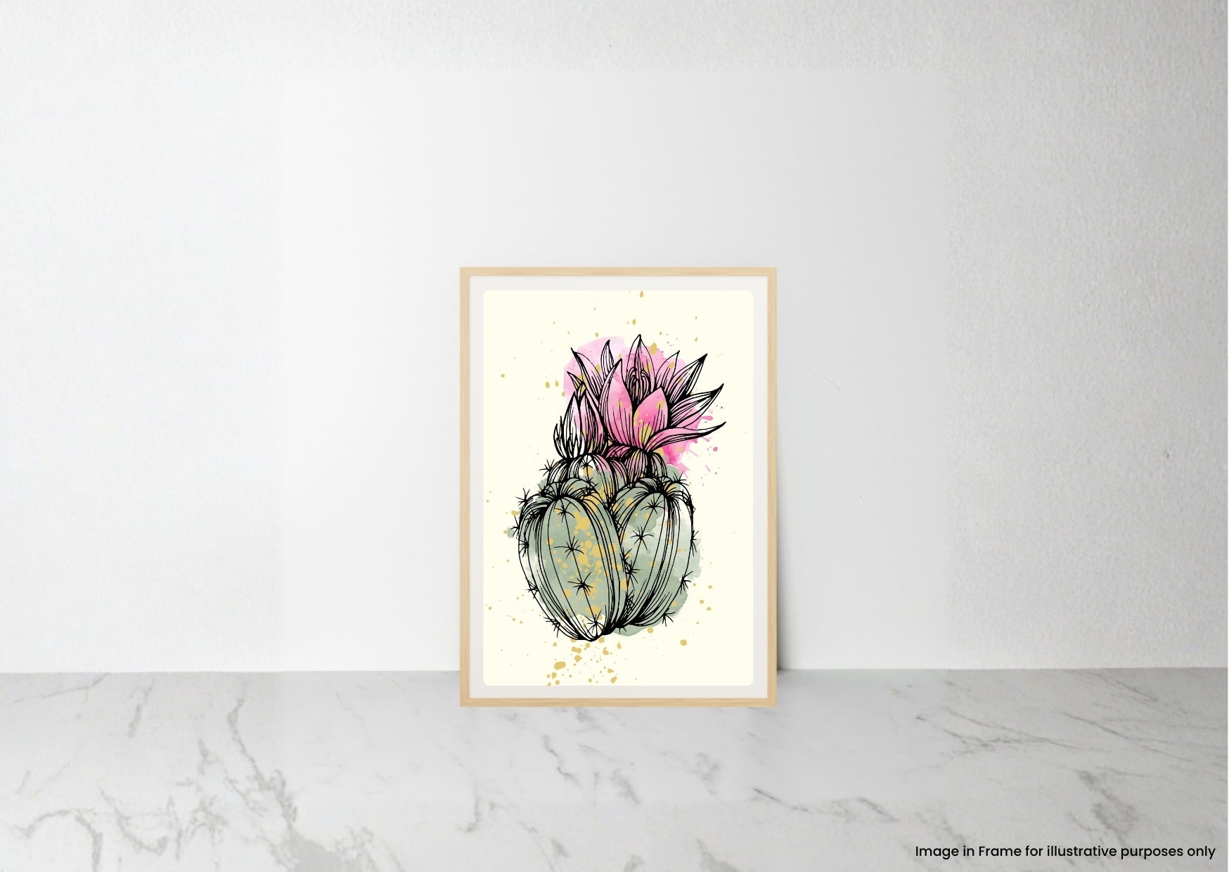 A framed botanical art print of a pink and green succulent cactus, displayed on a light gray marble surface against a white wall.