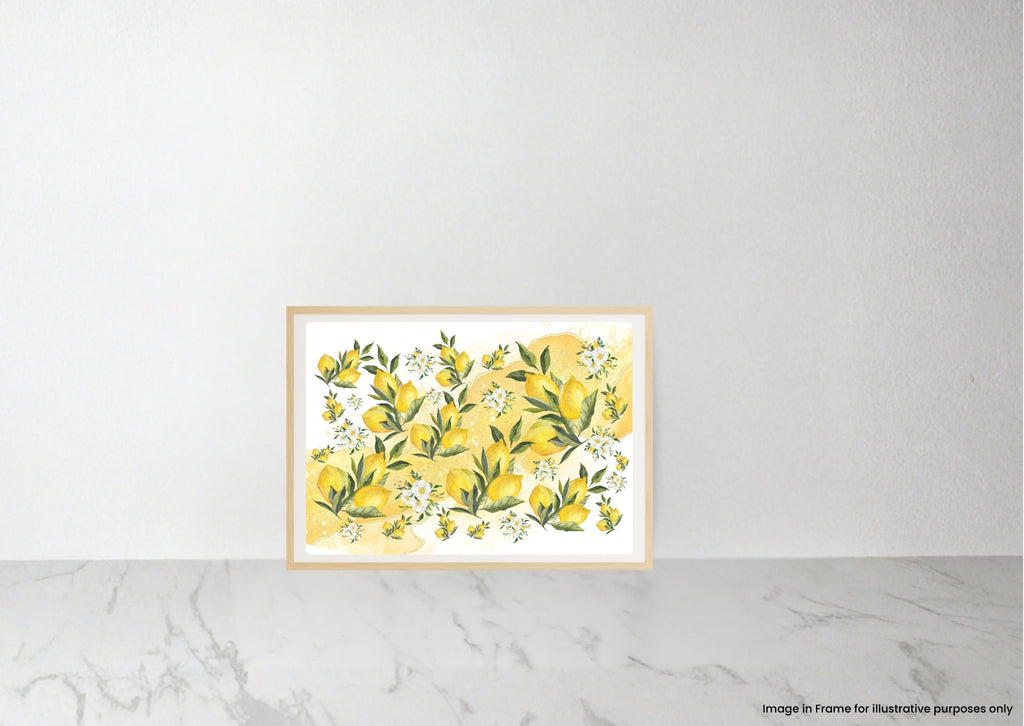 A framed botanical art print featuring yellow lemons and green leaves on a white background, displayed against a light gray wall on a white marble surface.