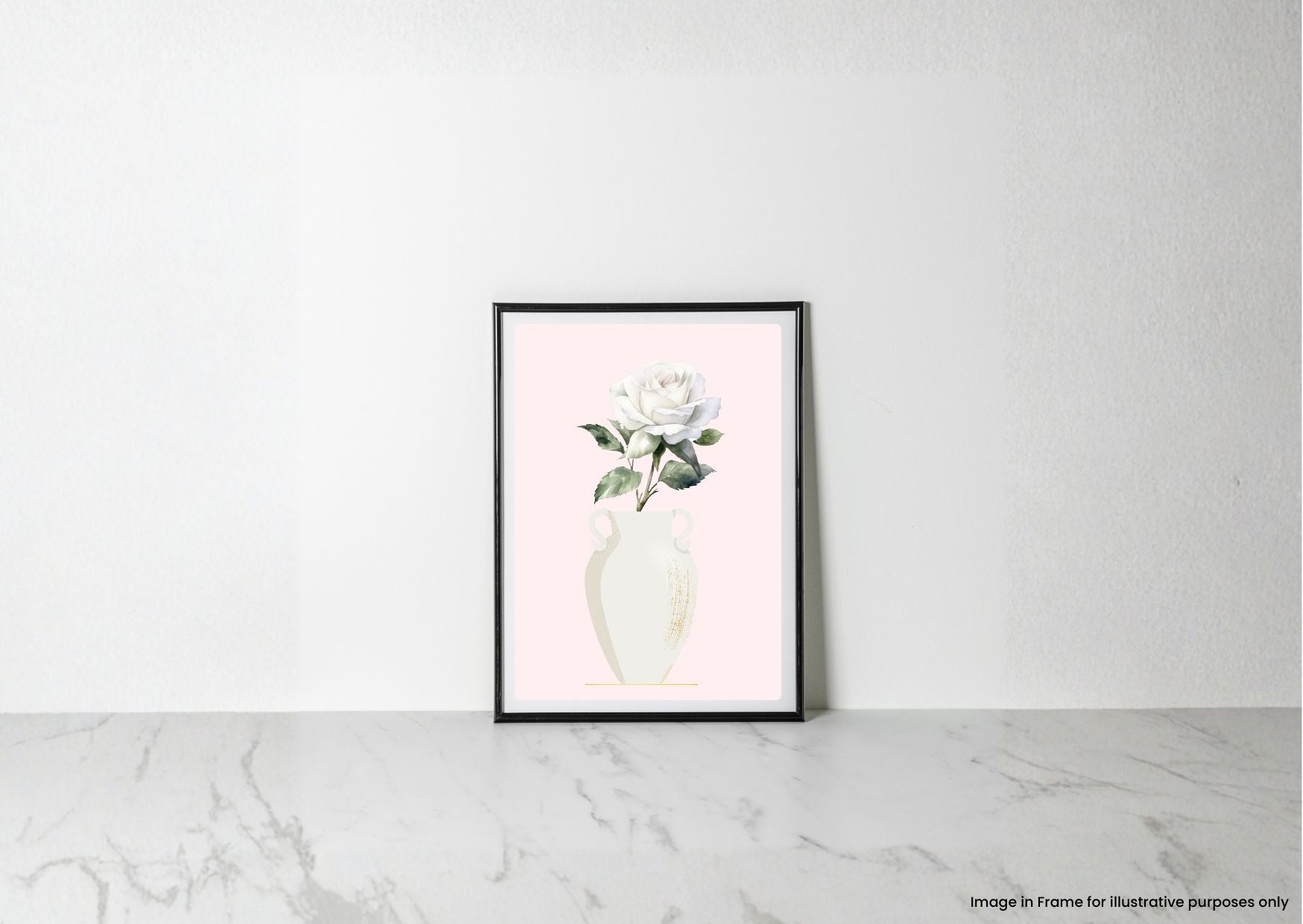 A framed botanical art print of a white rose in a cream vase against a pale pink background, leaning against a white wall on a light marble surface.