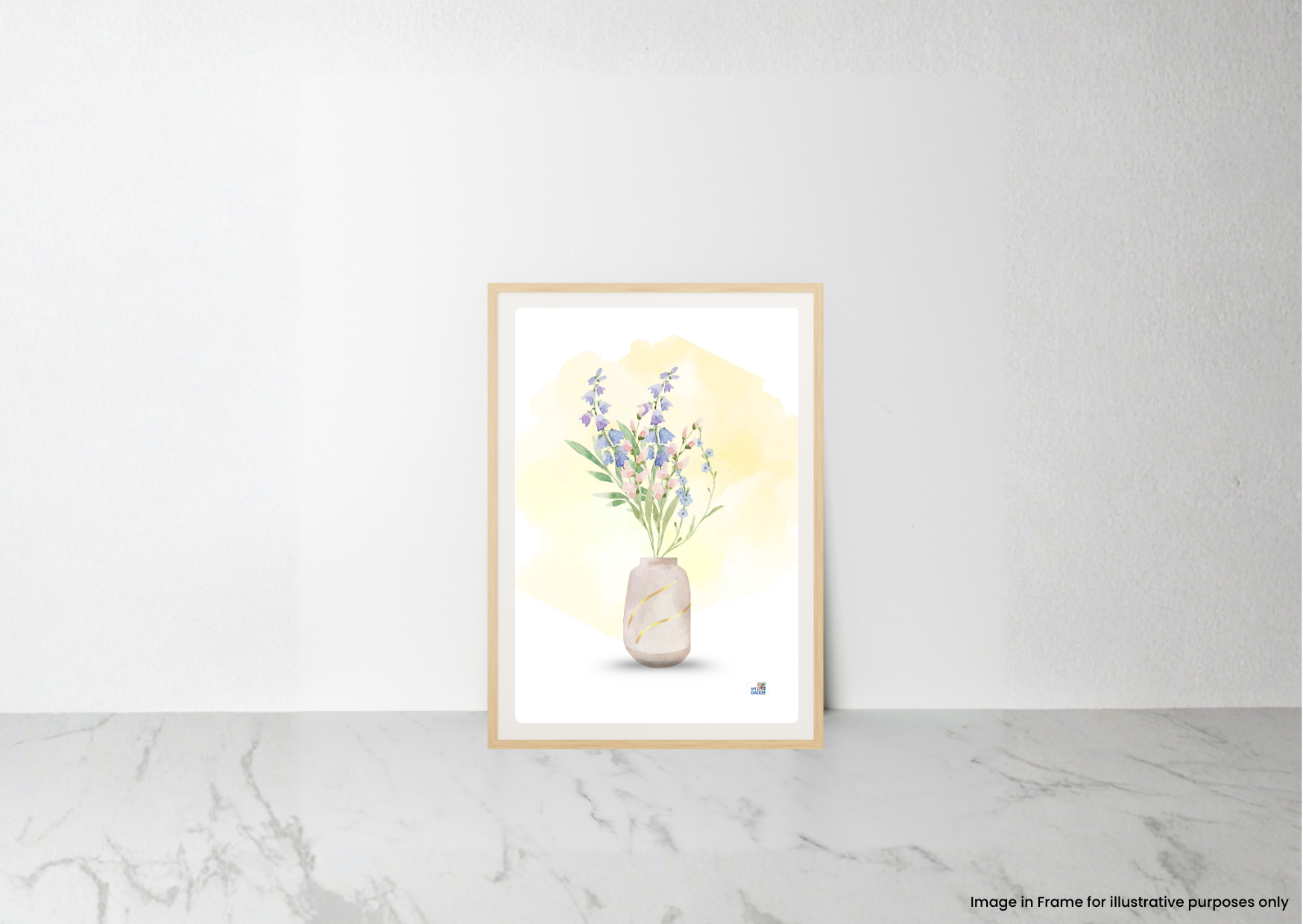 A framed watercolor art print of lavender flowers in a vase, displayed on a light marble surface against a white wall.
